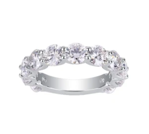 Band ring with 11 round moissanites, set in a continuous row with a shared-prong design, creating a full stone-row look. Sterling silver 925 (S925), silver-tone finish with double-layer plating. Weight: approximately 4.4g.