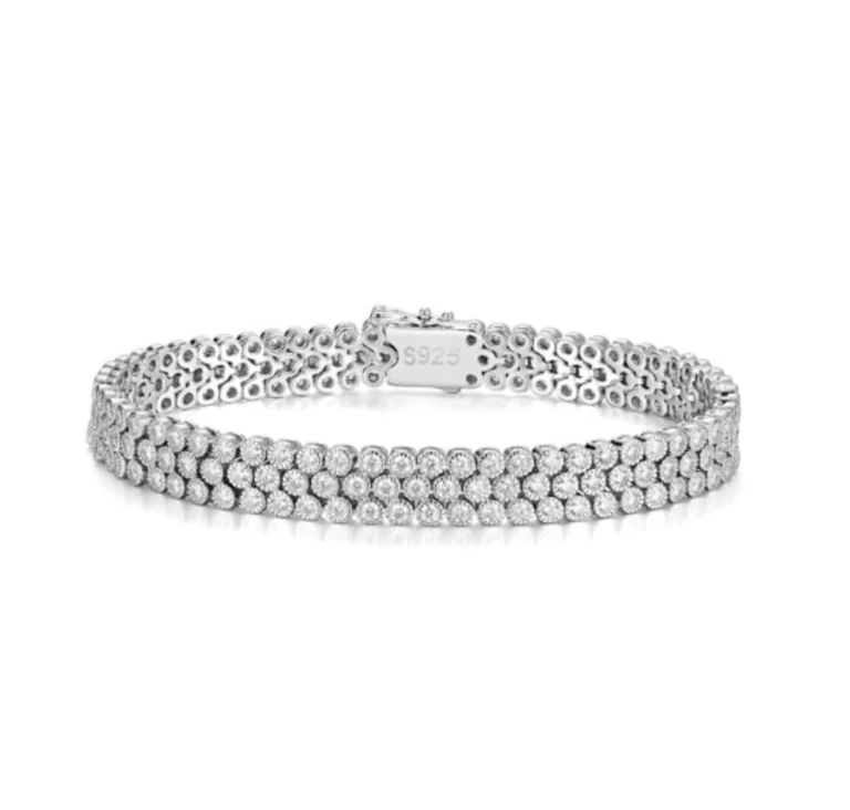 Bracelet in sterling silver 925 with 174 colour D moissanites set throughout. Simple, elegant and versatile design.